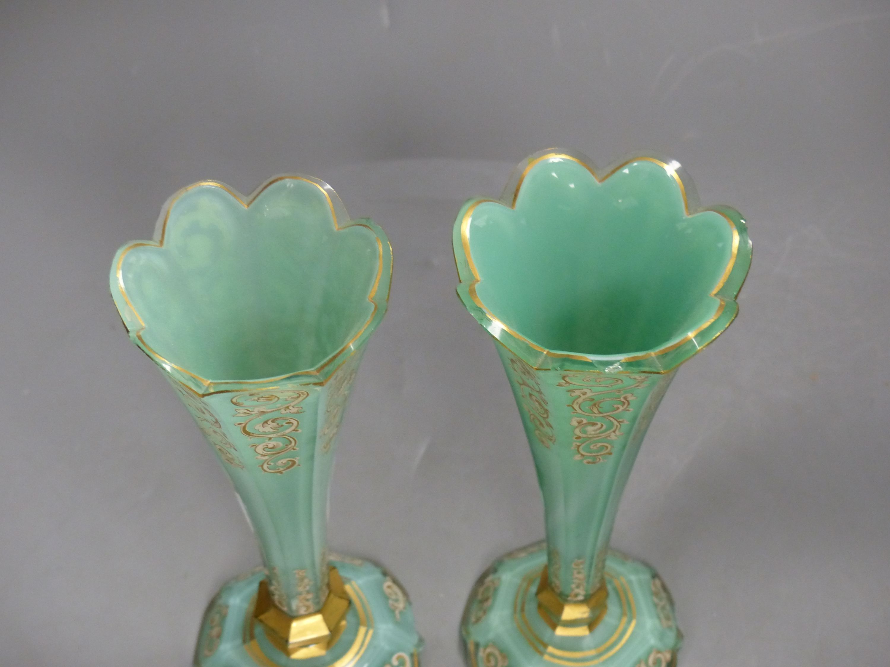 A pair of late 19th century Bohemian cased glass vases, height 21cm